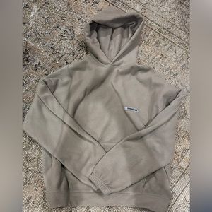 Fear of God Essentials fleece hoodie.